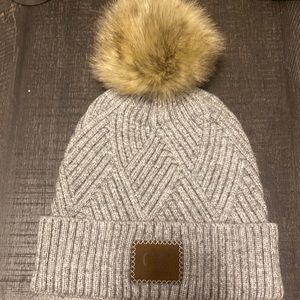 Gray CC beanie with pom. one size fits all. never worn.